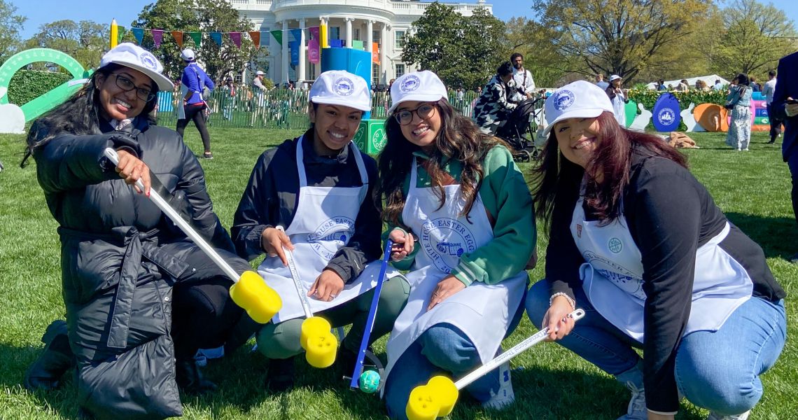 GW Occupational Therapy Students at White House Easter Egg Roll holding adaptive devices