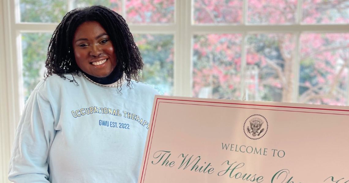 Fatima Koroma pictured next to White House sign