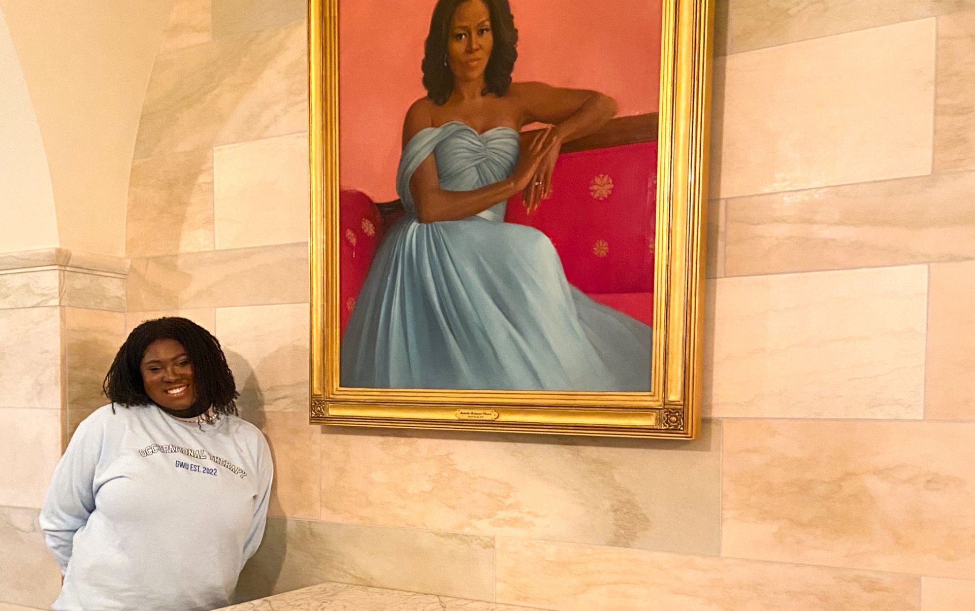 Fatima at White House in front of Michelle Obama Poster