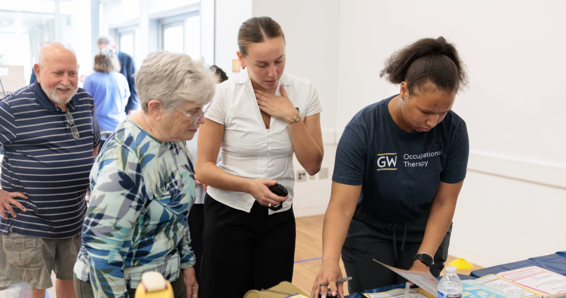OT student at check in of Falls Prevention Awareness Day