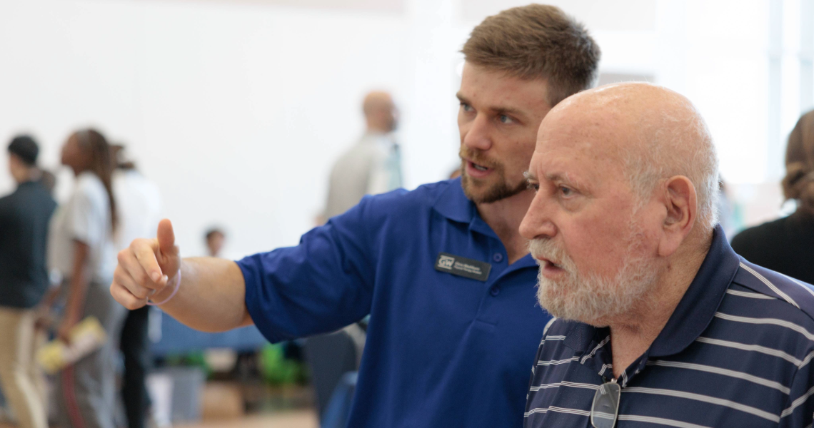 Student leading Vision Screening at Falls Prevention Awareness Day