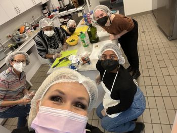 GW OT Students volunteering in kitchen